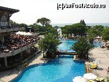 [P01] O parte din piscina mare.In spate se vede unul din topogane,iar in dreapta terasa restaurantului principal,iar dedesubt pool-bar-ul. » foto by cristina65
 - 
<span class="allrVoted glyphicon glyphicon-heart hidden" id="av271892"></span>
<a class="m-l-10 hidden" id="sv271892" onclick="voting_Foto_DelVot(,271892,10)" role="button">șterge vot <span class="glyphicon glyphicon-remove"></span></a>
<a id="v9271892" class=" c-red"  onclick="voting_Foto_SetVot(271892)" role="button"><span class="glyphicon glyphicon-heart-empty"></span> <b>LIKE</b> = Votează poza</a> <img class="hidden"  id="f271892W9" src="/imagini/loader.gif" border="0" /><span class="AjErrMes hidden" id="e271892ErM"></span>