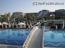 [P06] Trecerea peste piscina olimpica cu deschidere spre hotel; in partea stanga se vede o parte din terasa aferenta piscinelor. » foto by carmenplesa1977
 - 
<span class="allrVoted glyphicon glyphicon-heart hidden" id="av88066"></span>
<a class="m-l-10 hidden" id="sv88066" onclick="voting_Foto_DelVot(,88066,97)" role="button">șterge vot <span class="glyphicon glyphicon-remove"></span></a>
<a id="v988066" class=" c-red"  onclick="voting_Foto_SetVot(88066)" role="button"><span class="glyphicon glyphicon-heart-empty"></span> <b>LIKE</b> = Votează poza</a> <img class="hidden"  id="f88066W9" src="/imagini/loader.gif" border="0" /><span class="AjErrMes hidden" id="e88066ErM"></span>