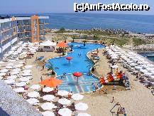 [P05] Piscina hotelului Dolphin Marina, vazuta din terasa barului de la receptie » foto by paulmihail2001
 - 
<span class="allrVoted glyphicon glyphicon-heart hidden" id="av228106"></span>
<a class="m-l-10 hidden" id="sv228106" onclick="voting_Foto_DelVot(,228106,994)" role="button">șterge vot <span class="glyphicon glyphicon-remove"></span></a>
<a id="v9228106" class=" c-red"  onclick="voting_Foto_SetVot(228106)" role="button"><span class="glyphicon glyphicon-heart-empty"></span> <b>LIKE</b> = Votează poza</a> <img class="hidden"  id="f228106W9" src="/imagini/loader.gif" border="0" /><span class="AjErrMes hidden" id="e228106ErM"></span>