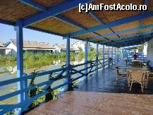 [P12] Satul pescaresc , terase lungi , acoperite  si largi , cu mobilier de gradina , ofera umbra , relaxare si prilejul de a sta cu prietenii sau familia la masa ( daca ai prins peste !) » foto by TORA INGRID
 - 
<span class="allrVoted glyphicon glyphicon-heart hidden" id="av81734"></span>
<a class="m-l-10 hidden" id="sv81734" onclick="voting_Foto_DelVot(,81734,2441)" role="button">șterge vot <span class="glyphicon glyphicon-remove"></span></a>
<a id="v981734" class=" c-red"  onclick="voting_Foto_SetVot(81734)" role="button"><span class="glyphicon glyphicon-heart-empty"></span> <b>LIKE</b> = Votează poza</a> <img class="hidden"  id="f81734W9" src="/imagini/loader.gif" border="0" /><span class="AjErrMes hidden" id="e81734ErM"></span>
