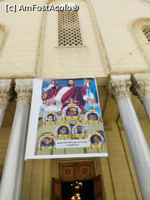 [P10] Catedrala ortodoxa copta din Alexandria, posterul cu pozele victimelor celui mai recent atentat, cel din 9 aprilie 2017 (in poster sunt doar 7, dar in total in urma atentatului care a avut loc aici au murit 18 oameni - inclusiv cei 3 politisti care pazeau intrarea si care erau de religie musulmana) » foto by calator2000
 - 
<span class="allrVoted glyphicon glyphicon-heart hidden" id="av856324"></span>
<a class="m-l-10 hidden" id="sv856324" onclick="voting_Foto_DelVot(,856324,2711)" role="button">șterge vot <span class="glyphicon glyphicon-remove"></span></a>
<a id="v9856324" class=" c-red"  onclick="voting_Foto_SetVot(856324)" role="button"><span class="glyphicon glyphicon-heart-empty"></span> <b>LIKE</b> = Votează poza</a> <img class="hidden"  id="f856324W9" src="/imagini/loader.gif" border="0" /><span class="AjErrMes hidden" id="e856324ErM"></span>