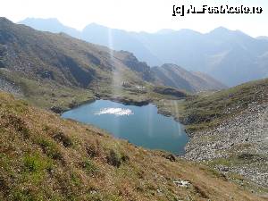 [P15] lacul Capra fotografiat din saua Capra » foto by wolf2001*
 - 
<span class="allrVoted glyphicon glyphicon-heart hidden" id="av689047"></span>
<a class="m-l-10 hidden" id="sv689047" onclick="voting_Foto_DelVot(,689047,2855)" role="button">șterge vot <span class="glyphicon glyphicon-remove"></span></a>
<a id="v9689047" class=" c-red"  onclick="voting_Foto_SetVot(689047)" role="button"><span class="glyphicon glyphicon-heart-empty"></span> <b>LIKE</b> = Votează poza</a> <img class="hidden"  id="f689047W9" src="/imagini/loader.gif" border="0" /><span class="AjErrMes hidden" id="e689047ErM"></span>