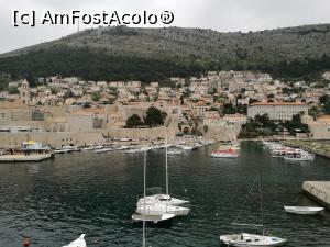 [P11] La plimbare pe zidurile cetății; vedere spre port » foto by crismis
 - 
<span class="allrVoted glyphicon glyphicon-heart hidden" id="av967922"></span>
<a class="m-l-10 hidden" id="sv967922" onclick="voting_Foto_DelVot(,967922,3304)" role="button">șterge vot <span class="glyphicon glyphicon-remove"></span></a>
<a id="v9967922" class=" c-red"  onclick="voting_Foto_SetVot(967922)" role="button"><span class="glyphicon glyphicon-heart-empty"></span> <b>LIKE</b> = Votează poza</a> <img class="hidden"  id="f967922W9" src="/imagini/loader.gif" border="0" /><span class="AjErrMes hidden" id="e967922ErM"></span>