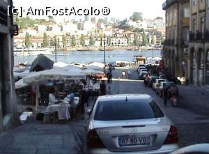 [P17] Străduţă în Ribeira care coboară spre Douro - în fundal, cartierul Vila Nova de Gaia.  » foto by Carmen Ion
 - 
<span class="allrVoted glyphicon glyphicon-heart hidden" id="av721189"></span>
<a class="m-l-10 hidden" id="sv721189" onclick="voting_Foto_DelVot(,721189,4082)" role="button">șterge vot <span class="glyphicon glyphicon-remove"></span></a>
<a id="v9721189" class=" c-red"  onclick="voting_Foto_SetVot(721189)" role="button"><span class="glyphicon glyphicon-heart-empty"></span> <b>LIKE</b> = Votează poza</a> <img class="hidden"  id="f721189W9" src="/imagini/loader.gif" border="0" /><span class="AjErrMes hidden" id="e721189ErM"></span>