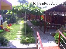 [P08] Gradina, in stanga, spatiul de joaca iar in dreapta locul de luat masa » foto by krondia*
 - 
<span class="allrVoted glyphicon glyphicon-heart hidden" id="av92301"></span>
<a class="m-l-10 hidden" id="sv92301" onclick="voting_Foto_DelVot(,92301,4210)" role="button">șterge vot <span class="glyphicon glyphicon-remove"></span></a>
<a id="v992301" class=" c-red"  onclick="voting_Foto_SetVot(92301)" role="button"><span class="glyphicon glyphicon-heart-empty"></span> <b>LIKE</b> = Votează poza</a> <img class="hidden"  id="f92301W9" src="/imagini/loader.gif" border="0" /><span class="AjErrMes hidden" id="e92301ErM"></span>