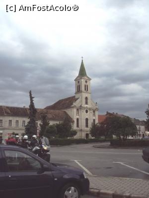 [P23] Biserica romano-catolică și piața Cuza Vodă.  » foto by Carmen Ion
 - 
<span class="allrVoted glyphicon glyphicon-heart hidden" id="av875435"></span>
<a class="m-l-10 hidden" id="sv875435" onclick="voting_Foto_DelVot(,875435,5247)" role="button">șterge vot <span class="glyphicon glyphicon-remove"></span></a>
<a id="v9875435" class=" c-red"  onclick="voting_Foto_SetVot(875435)" role="button"><span class="glyphicon glyphicon-heart-empty"></span> <b>LIKE</b> = Votează poza</a> <img class="hidden"  id="f875435W9" src="/imagini/loader.gif" border="0" /><span class="AjErrMes hidden" id="e875435ErM"></span>