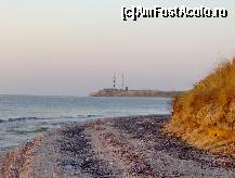 [P19] 2006, august, 05AM Farul Tuzla, văzut de pe o plajă pustie de 3,5m lăţime, alături de pescăruşi şi doi delfini jucăuşi. » foto by cc_iordachescu
 - 
<span class="allrVoted glyphicon glyphicon-heart hidden" id="av60042"></span>
<a class="m-l-10 hidden" id="sv60042" onclick="voting_Foto_DelVot(,60042,5277)" role="button">șterge vot <span class="glyphicon glyphicon-remove"></span></a>
<a id="v960042" class=" c-red"  onclick="voting_Foto_SetVot(60042)" role="button"><span class="glyphicon glyphicon-heart-empty"></span> <b>LIKE</b> = Votează poza</a> <img class="hidden"  id="f60042W9" src="/imagini/loader.gif" border="0" /><span class="AjErrMes hidden" id="e60042ErM"></span>