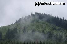 [P22] Pe dealul de la sudul mănăstirii Putna, printre nori se zăreşte crucea din vârf. Mai jos, pe panta dezgolită, se poate citi cuvântul ŞTEFAN, scris cu brăduţi » foto by Costi
 - 
<span class="allrVoted glyphicon glyphicon-heart hidden" id="av77913"></span>
<a class="m-l-10 hidden" id="sv77913" onclick="voting_Foto_DelVot(,77913,5846)" role="button">șterge vot <span class="glyphicon glyphicon-remove"></span></a>
<a id="v977913" class=" c-red"  onclick="voting_Foto_SetVot(77913)" role="button"><span class="glyphicon glyphicon-heart-empty"></span> <b>LIKE</b> = Votează poza</a> <img class="hidden"  id="f77913W9" src="/imagini/loader.gif" border="0" /><span class="AjErrMes hidden" id="e77913ErM"></span>