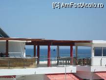 [P19] vedere de pe balcon Kolymbia Bay Art.E un magazin in fata. » foto by ARA
 - 
<span class="allrVoted glyphicon glyphicon-heart hidden" id="av90146"></span>
<a class="m-l-10 hidden" id="sv90146" onclick="voting_Foto_DelVot(,90146,6057)" role="button">șterge vot <span class="glyphicon glyphicon-remove"></span></a>
<a id="v990146" class=" c-red"  onclick="voting_Foto_SetVot(90146)" role="button"><span class="glyphicon glyphicon-heart-empty"></span> <b>LIKE</b> = Votează poza</a> <img class="hidden"  id="f90146W9" src="/imagini/loader.gif" border="0" /><span class="AjErrMes hidden" id="e90146ErM"></span>