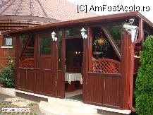 [P23] Restaurantul Karikas - intrarea pe terasă. » foto by creivean
 - 
<span class="allrVoted glyphicon glyphicon-heart hidden" id="av86930"></span>
<a class="m-l-10 hidden" id="sv86930" onclick="voting_Foto_DelVot(,86930,6135)" role="button">șterge vot <span class="glyphicon glyphicon-remove"></span></a>
<a id="v986930" class=" c-red"  onclick="voting_Foto_SetVot(86930)" role="button"><span class="glyphicon glyphicon-heart-empty"></span> <b>LIKE</b> = Votează poza</a> <img class="hidden"  id="f86930W9" src="/imagini/loader.gif" border="0" /><span class="AjErrMes hidden" id="e86930ErM"></span>