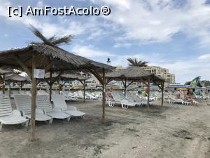 [P10] Plaja la Sunset. Se observa umbrelutele cu galben si albastru care sunt ale resortului. Cele cu paie sunt cu plata.  » foto by adynutza26
 - 
<span class="allrVoted glyphicon glyphicon-heart hidden" id="av984144"></span>
<a class="m-l-10 hidden" id="sv984144" onclick="voting_Foto_DelVot(,984144,6139)" role="button">șterge vot <span class="glyphicon glyphicon-remove"></span></a>
<a id="v9984144" class=" c-red"  onclick="voting_Foto_SetVot(984144)" role="button"><span class="glyphicon glyphicon-heart-empty"></span> <b>LIKE</b> = Votează poza</a> <img class="hidden"  id="f984144W9" src="/imagini/loader.gif" border="0" /><span class="AjErrMes hidden" id="e984144ErM"></span>