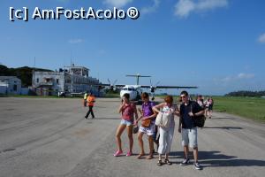[P01] Sosirea pe aeroportul din Zanzibar. In spate e avionul Precision air » foto by Lila Mo
 - 
<span class="allrVoted glyphicon glyphicon-heart hidden" id="av726283"></span>
<a class="m-l-10 hidden" id="sv726283" onclick="voting_Foto_DelVot(,726283,6379)" role="button">șterge vot <span class="glyphicon glyphicon-remove"></span></a>
<a id="v9726283" class=" c-red"  onclick="voting_Foto_SetVot(726283)" role="button"><span class="glyphicon glyphicon-heart-empty"></span> <b>LIKE</b> = Votează poza</a> <img class="hidden"  id="f726283W9" src="/imagini/loader.gif" border="0" /><span class="AjErrMes hidden" id="e726283ErM"></span>