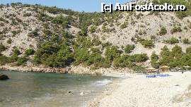[P14] Livadi Beach: in apropiere se vede partea de plaja cu pietre. Cu acestea este o plaja deosebita datorita reliefului inconjurator.  » foto by Nicu V
 - 
<span class="allrVoted glyphicon glyphicon-heart hidden" id="av401779"></span>
<a class="m-l-10 hidden" id="sv401779" onclick="voting_Foto_DelVot(,401779,7269)" role="button">șterge vot <span class="glyphicon glyphicon-remove"></span></a>
<a id="v9401779" class=" c-red"  onclick="voting_Foto_SetVot(401779)" role="button"><span class="glyphicon glyphicon-heart-empty"></span> <b>LIKE</b> = Votează poza</a> <img class="hidden"  id="f401779W9" src="/imagini/loader.gif" border="0" /><span class="AjErrMes hidden" id="e401779ErM"></span>