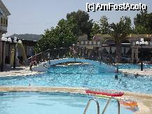 [P02] Piscina din zona centrala, in plan indepartat taverna » foto by egurlui
 - 
<span class="allrVoted glyphicon glyphicon-heart hidden" id="av333083"></span>
<a class="m-l-10 hidden" id="sv333083" onclick="voting_Foto_DelVot(,333083,7881)" role="button">șterge vot <span class="glyphicon glyphicon-remove"></span></a>
<a id="v9333083" class=" c-red"  onclick="voting_Foto_SetVot(333083)" role="button"><span class="glyphicon glyphicon-heart-empty"></span> <b>LIKE</b> = Votează poza</a> <img class="hidden"  id="f333083W9" src="/imagini/loader.gif" border="0" /><span class="AjErrMes hidden" id="e333083ErM"></span>