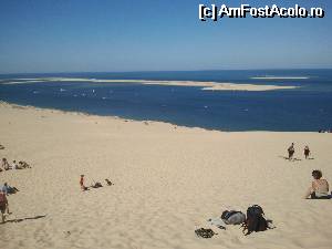 [P03] De sus de pe varful dunei, imaginea oceanului este de o frumusete uluitoare.  » foto by Mika
 - 
<span class="allrVoted glyphicon glyphicon-heart hidden" id="av543033"></span>
<a class="m-l-10 hidden" id="sv543033" onclick="voting_Foto_DelVot(,543033,10440)" role="button">șterge vot <span class="glyphicon glyphicon-remove"></span></a>
<a id="v9543033" class=" c-red"  onclick="voting_Foto_SetVot(543033)" role="button"><span class="glyphicon glyphicon-heart-empty"></span> <b>LIKE</b> = Votează poza</a> <img class="hidden"  id="f543033W9" src="/imagini/loader.gif" border="0" /><span class="AjErrMes hidden" id="e543033ErM"></span>
