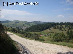 [P06] Am ajuns la intrarea în parcarea mănăstirii. Aruncăm o privire înapoi în vale, spre localitatea Sita Buzăului.  » foto by Floryn81
 - 
<span class="allrVoted glyphicon glyphicon-heart hidden" id="av799116"></span>
<a class="m-l-10 hidden" id="sv799116" onclick="voting_Foto_DelVot(,799116,23061)" role="button">șterge vot <span class="glyphicon glyphicon-remove"></span></a>
<a id="v9799116" class=" c-red"  onclick="voting_Foto_SetVot(799116)" role="button"><span class="glyphicon glyphicon-heart-empty"></span> <b>LIKE</b> = Votează poza</a> <img class="hidden"  id="f799116W9" src="/imagini/loader.gif" border="0" /><span class="AjErrMes hidden" id="e799116ErM"></span>