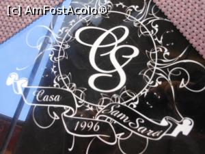 [P02] Cernavodă - Casa SamSara. Numele și anul inaugurării pe colțul fiecărei mese de pe terasă.  » foto by iulianic
 - 
<span class="allrVoted glyphicon glyphicon-heart hidden" id="av1001827"></span>
<a class="m-l-10 hidden" id="sv1001827" onclick="voting_Foto_DelVot(,1001827,24188)" role="button">șterge vot <span class="glyphicon glyphicon-remove"></span></a>
<a id="v91001827" class=" c-red"  onclick="voting_Foto_SetVot(1001827)" role="button"><span class="glyphicon glyphicon-heart-empty"></span> <b>LIKE</b> = Votează poza</a> <img class="hidden"  id="f1001827W9" src="/imagini/loader.gif" border="0" /><span class="AjErrMes hidden" id="e1001827ErM"></span>